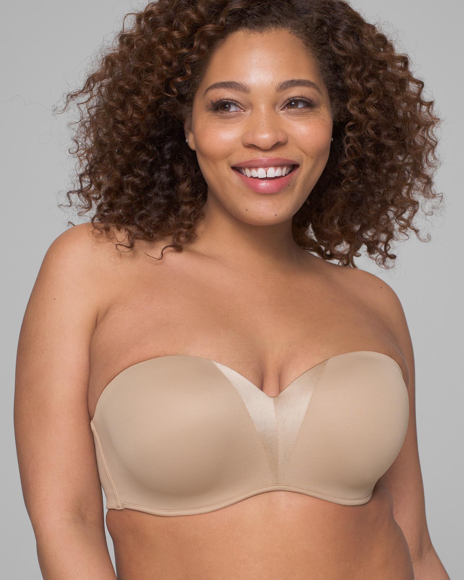 Soma<sup class=st-superscript>®</sup> women’s model wearing a nude strapless bra. 