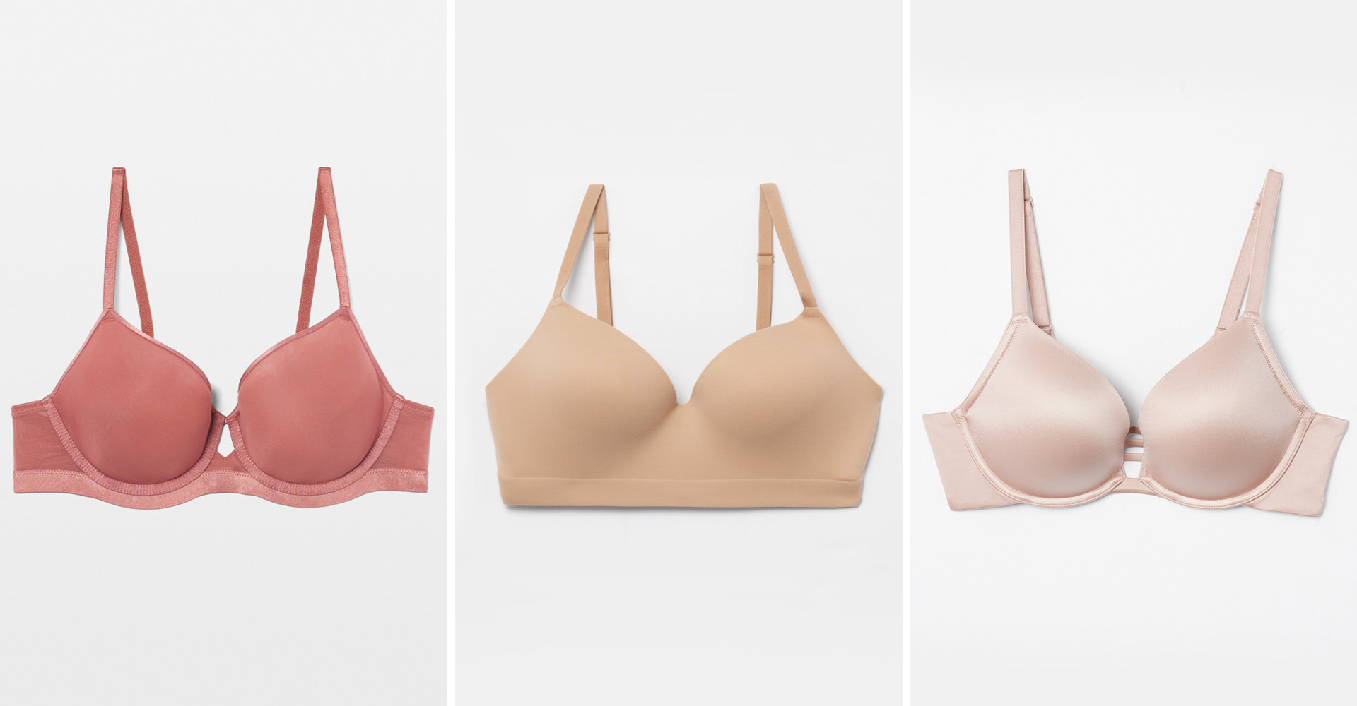 Laydown of dark pink lined bra, beige lined bra, and off-white lined bra.