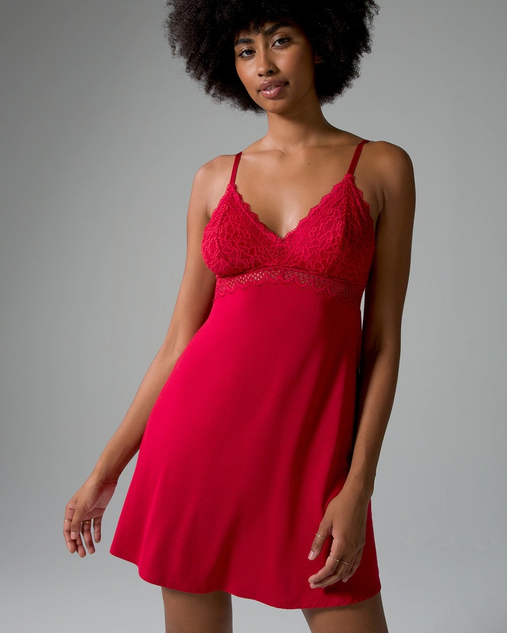 Soma<sup class=st-superscript>®</sup> women’s model wearing red chemise with lace bust.