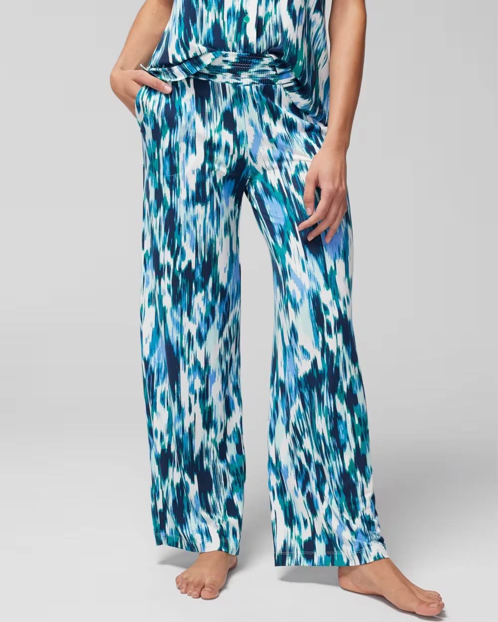 Soma<sup class=st-superscript>®</sup> women’s model wearing blue ikat printed pajama pants.