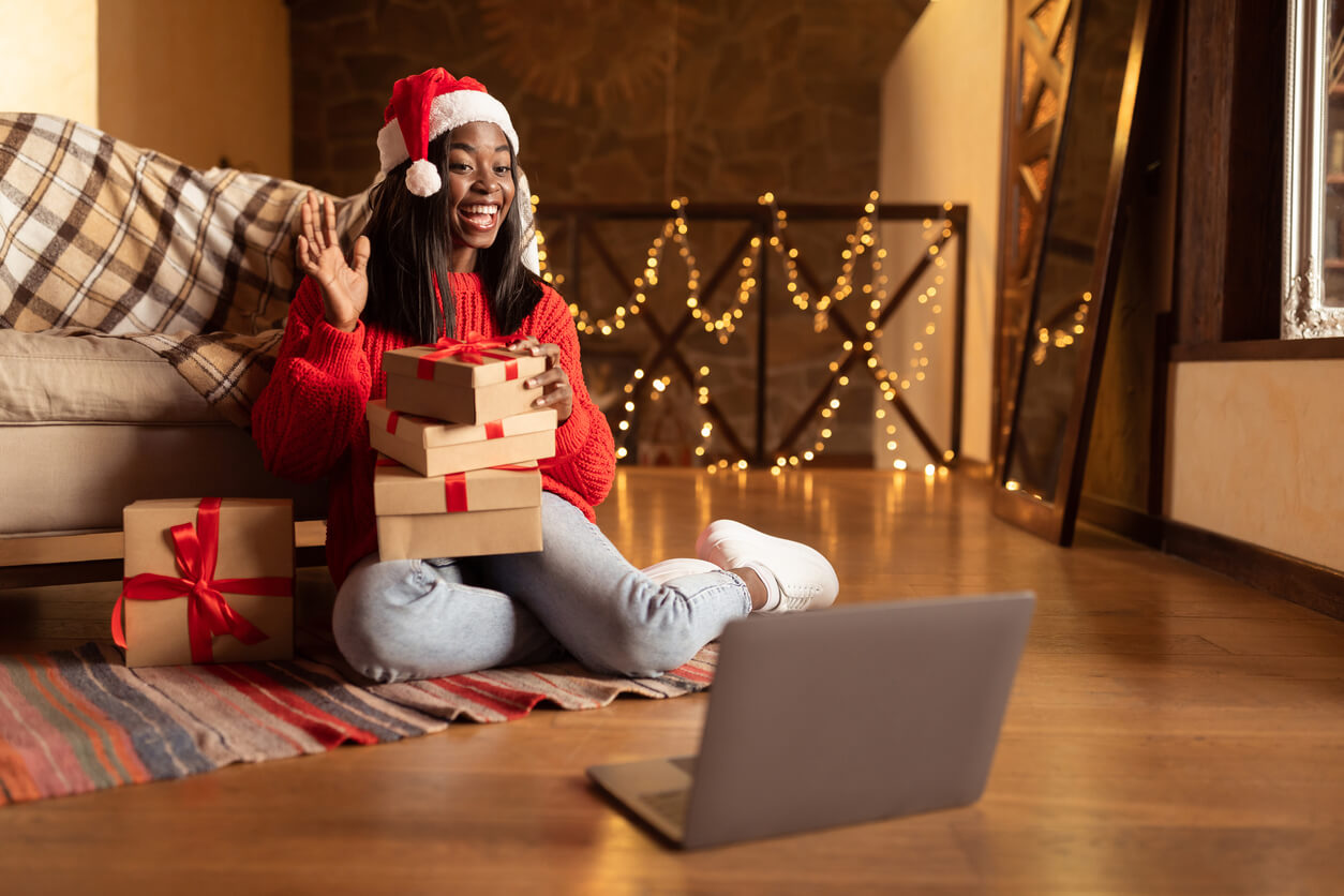 Virtual Christmas Party shown with gifts being opened.
