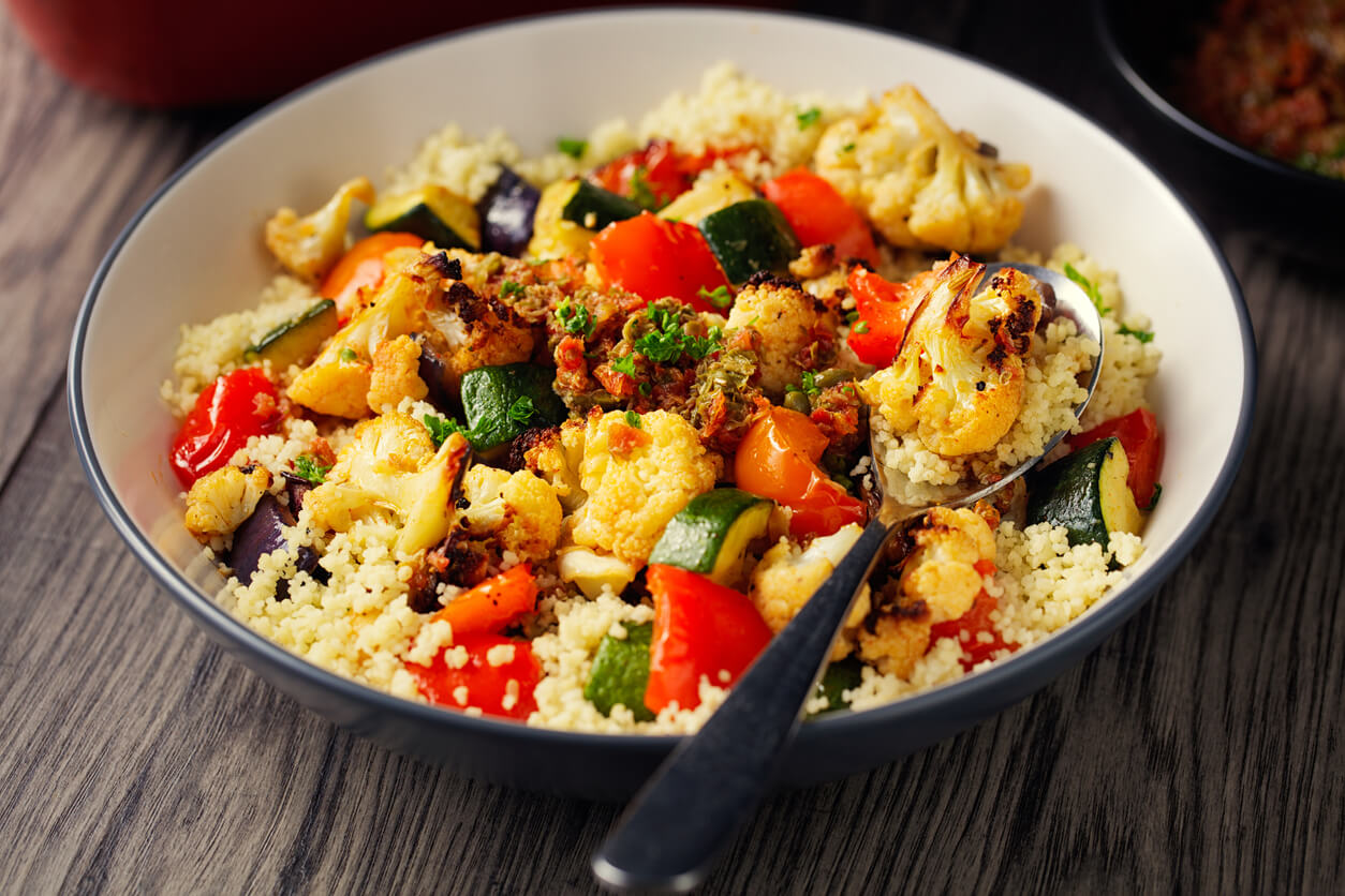 Healthy roasted vegetable with couscous vegan bowl