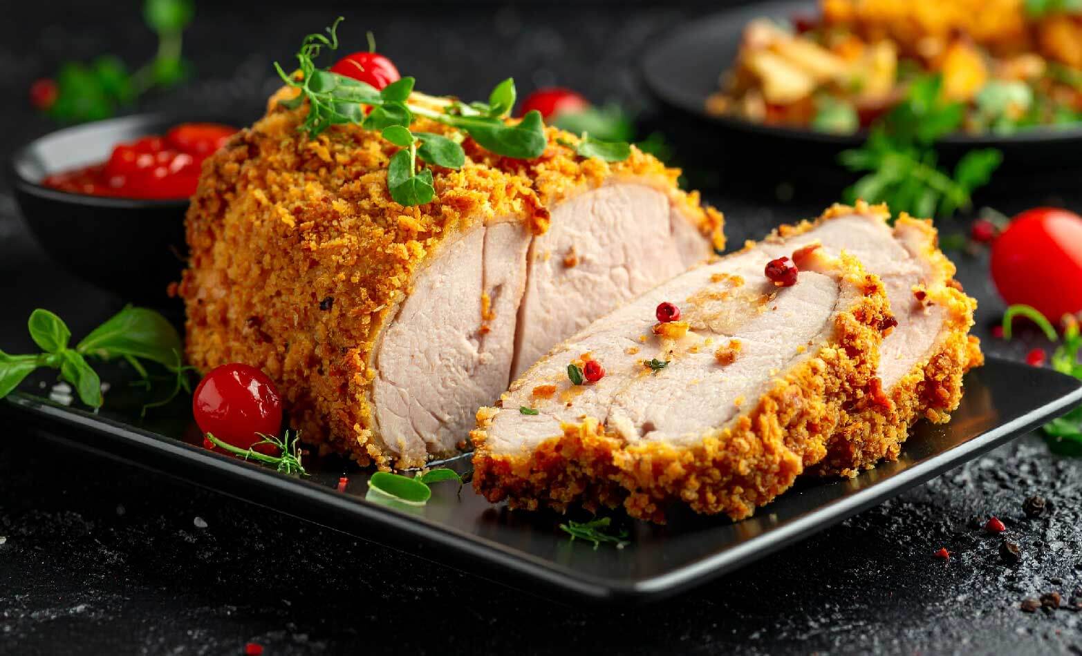 a stock photo of breaded pork tenderloin