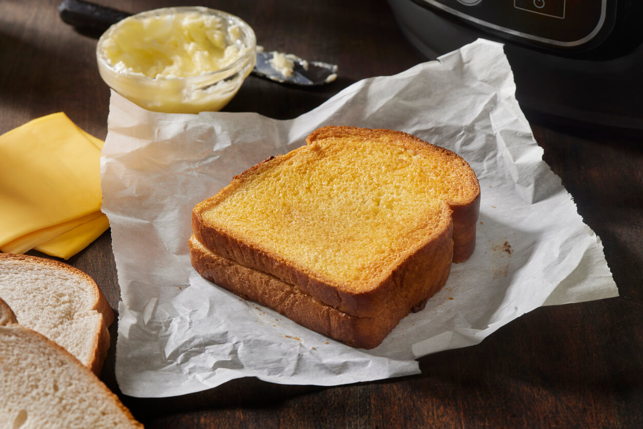 Preparing a Grilled Cheese Sandwich with Processed Cheese Slices and White Bread in the Air Fryer