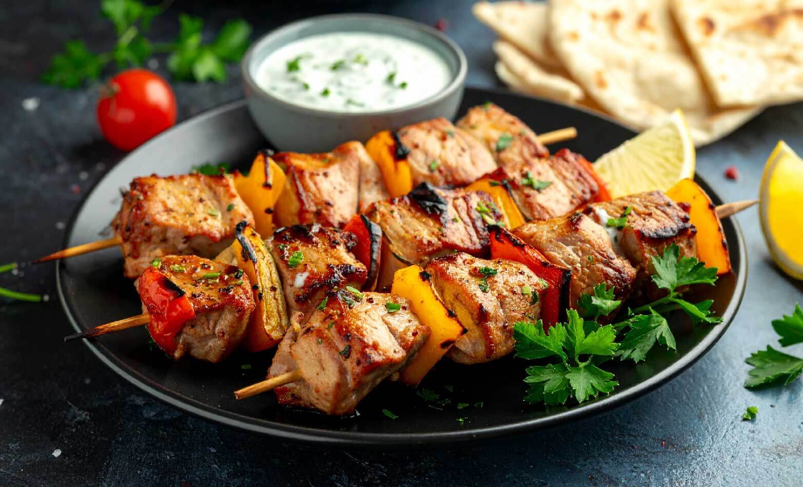 a stock photo of pork skewers