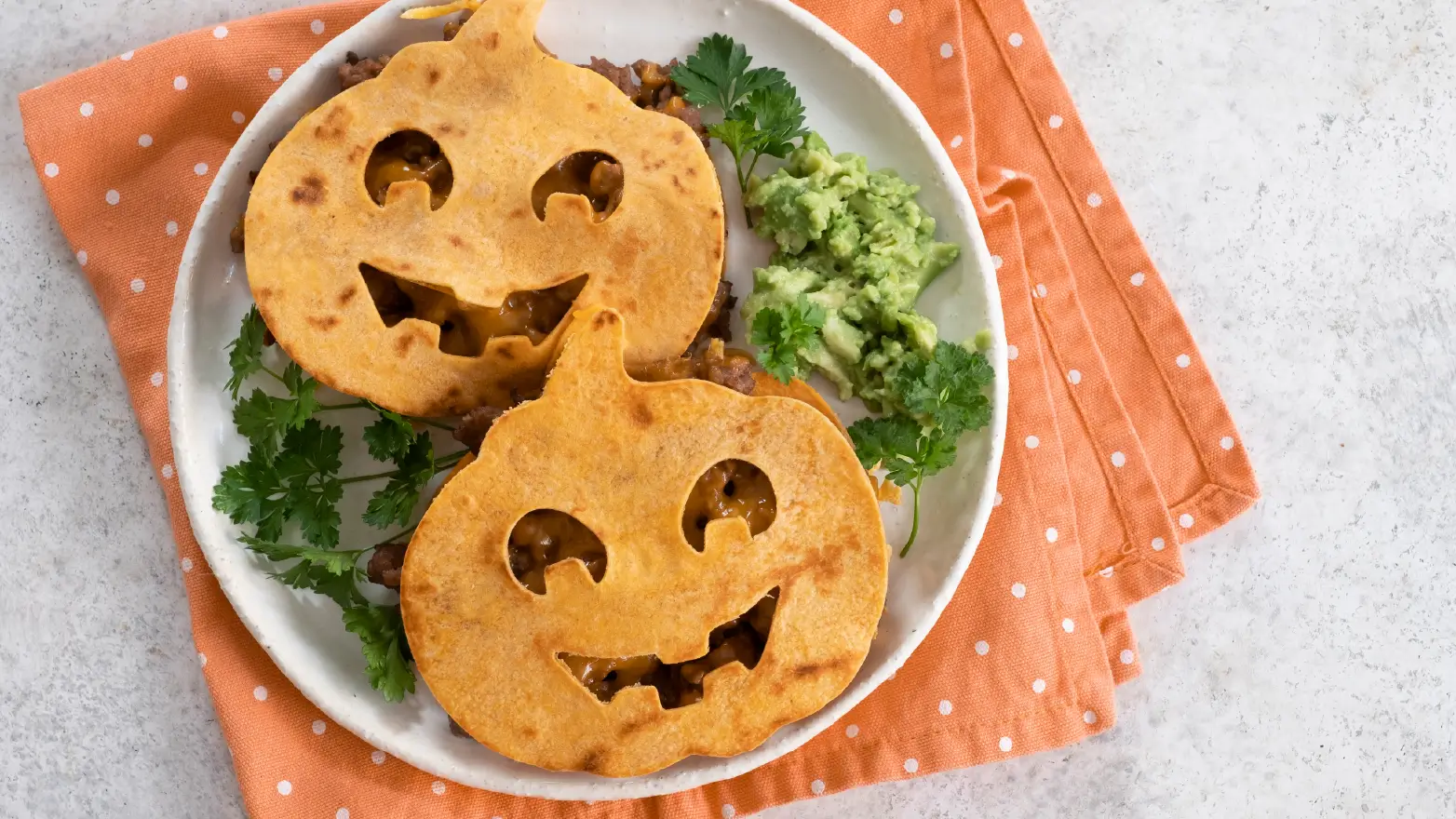 Jack-o’-lantern quesadillas