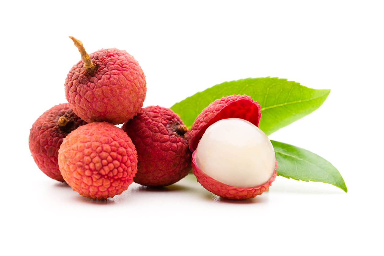 Lychee fruits on white background