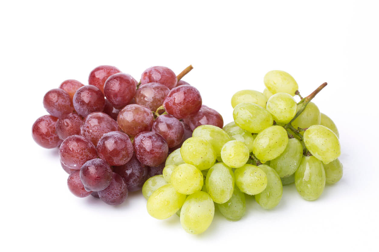 A bunch of green and red grapes.