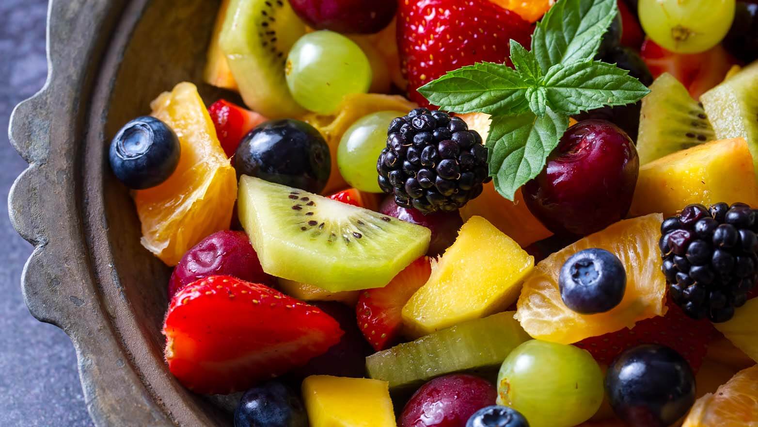 Rainbow fruit salad with honey-lime dressing