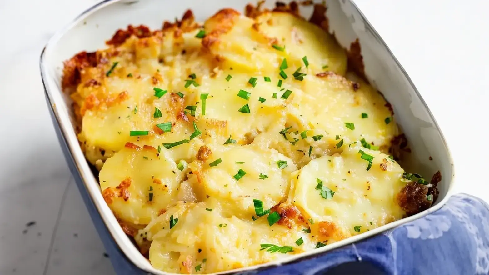 Casserole dish of scalloped potatoes.