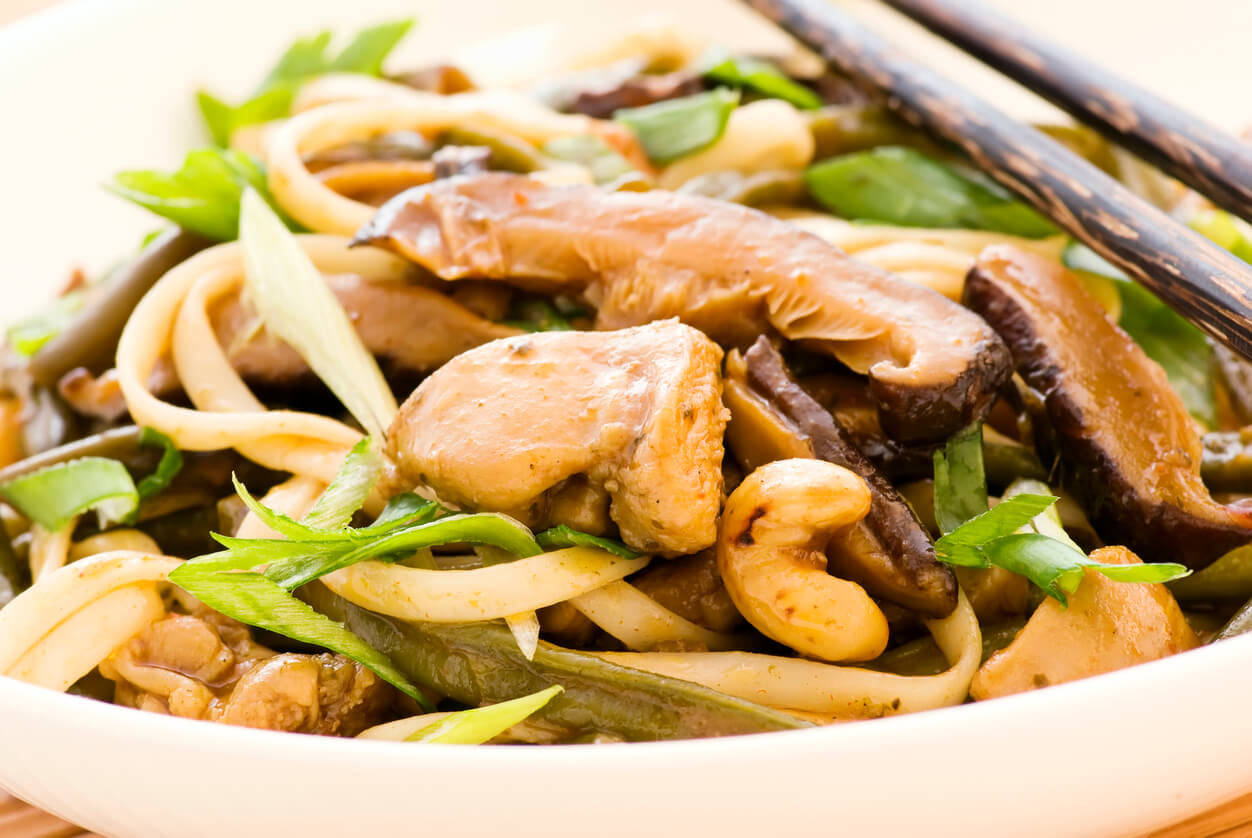 Cashew and snow-pea stir fry in a plate.