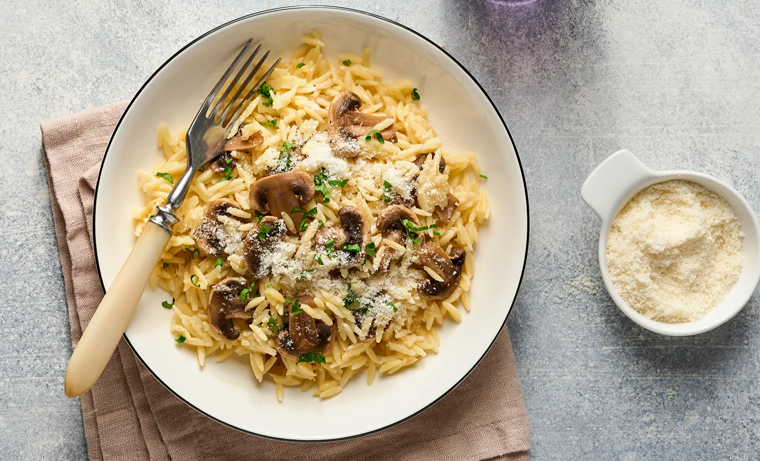 A bowl of cheesy orzo