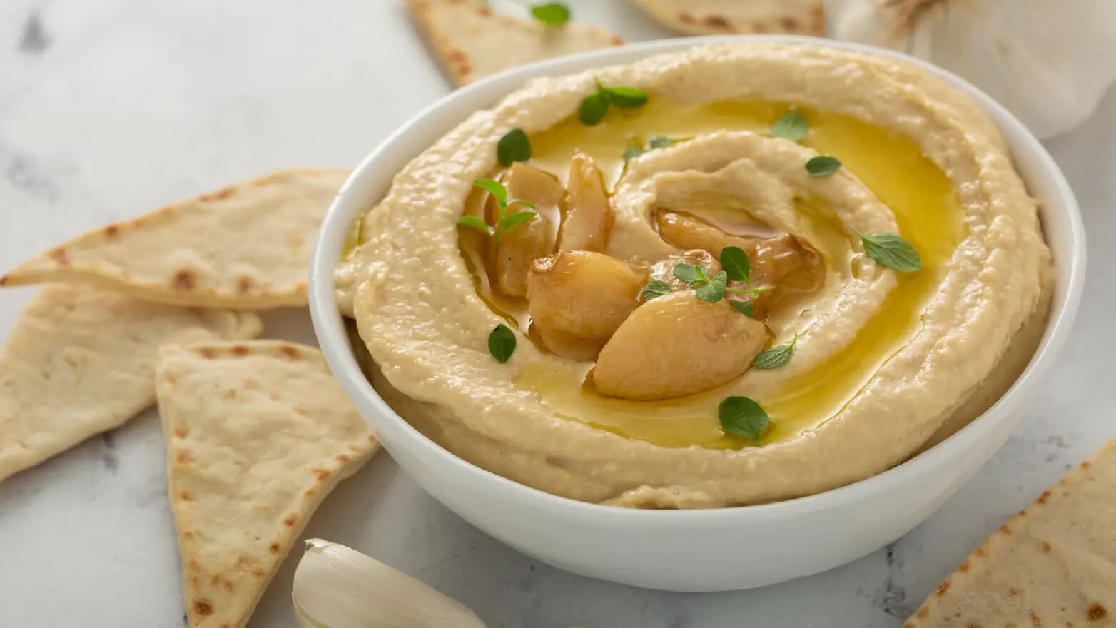 Stock image of hummus with pita bread