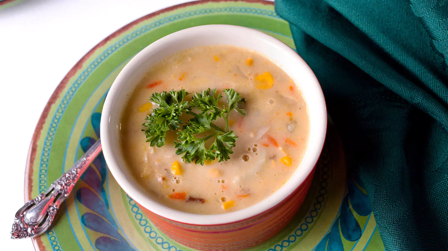A cup of chicken corn soup.
