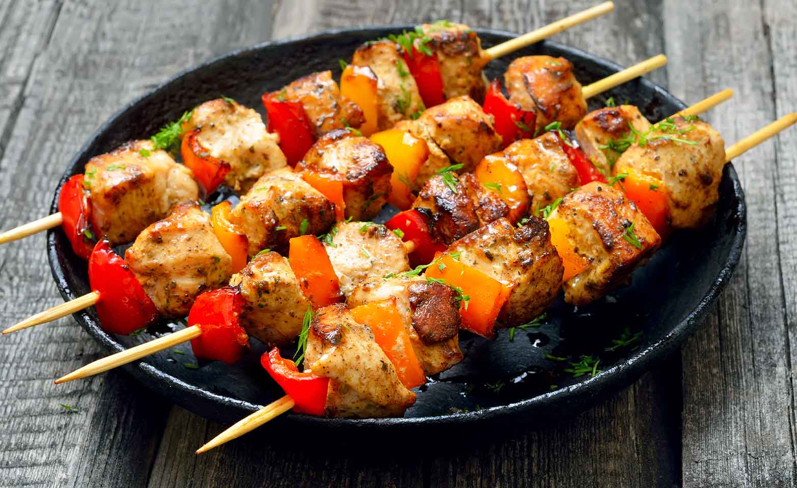 Stock image of grilled chicken kabobs