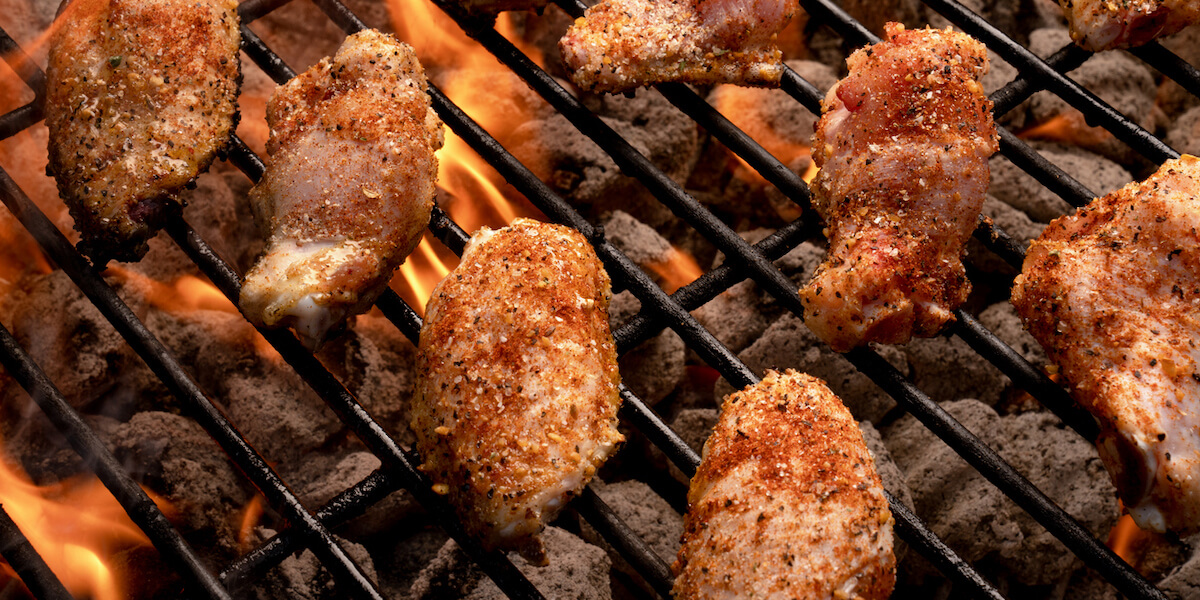 Barbecued Buffalo Chicken Wings On A Fiery Grill