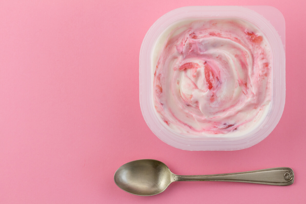 Yogurt cup with natural strawberry Greek style yogurt swirled with real strawberries