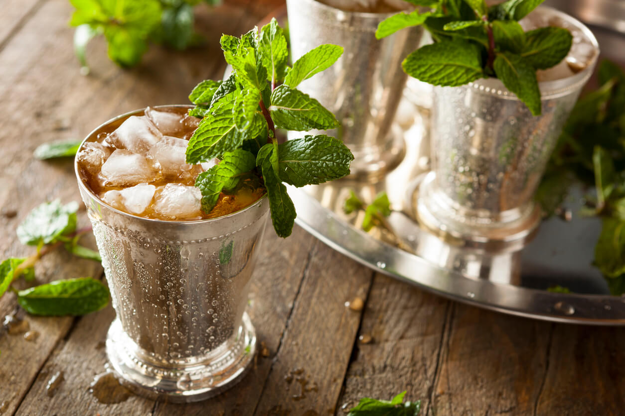 Ice cold mint julep in a metal cup
