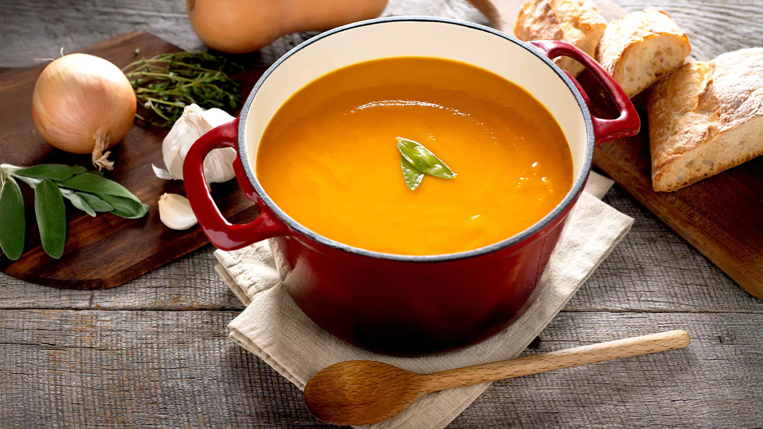 Creamy butternut squash soup in a pot.