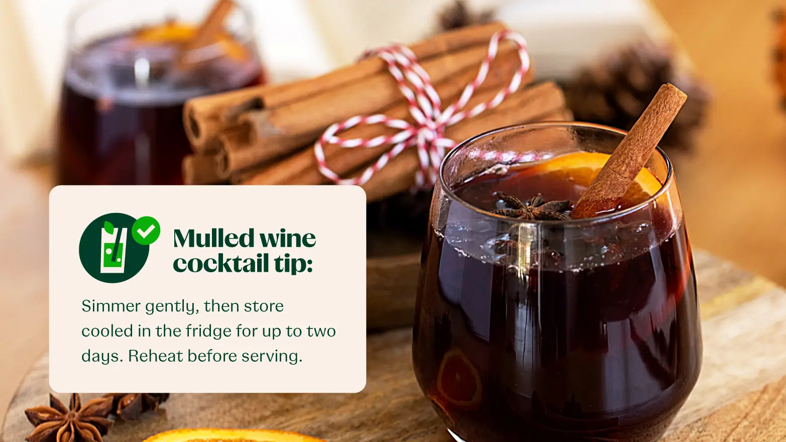 mulled wine cocktail with cinnamon sticks