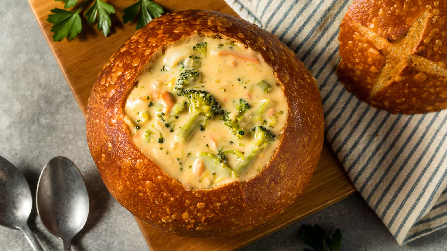 Broccoli cheddar soup in a bread bowl.