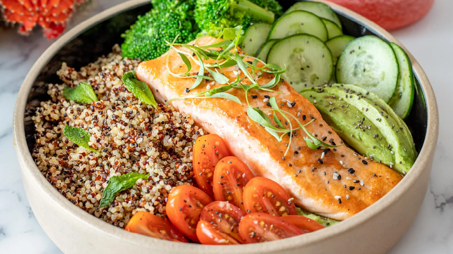a photo of a salmon bowl with ginger dressing