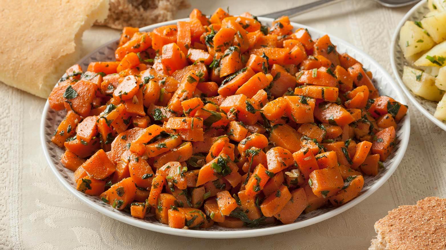 Shaved rainbow carrot salad with pomegranates and pistachios