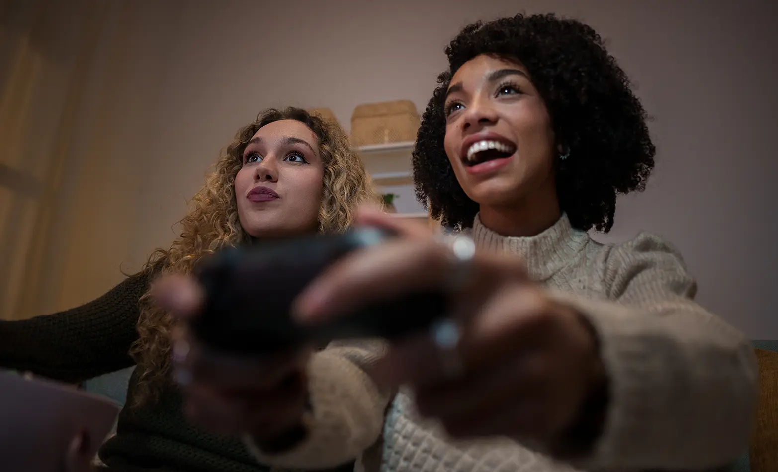 A photo of friends playing video games.