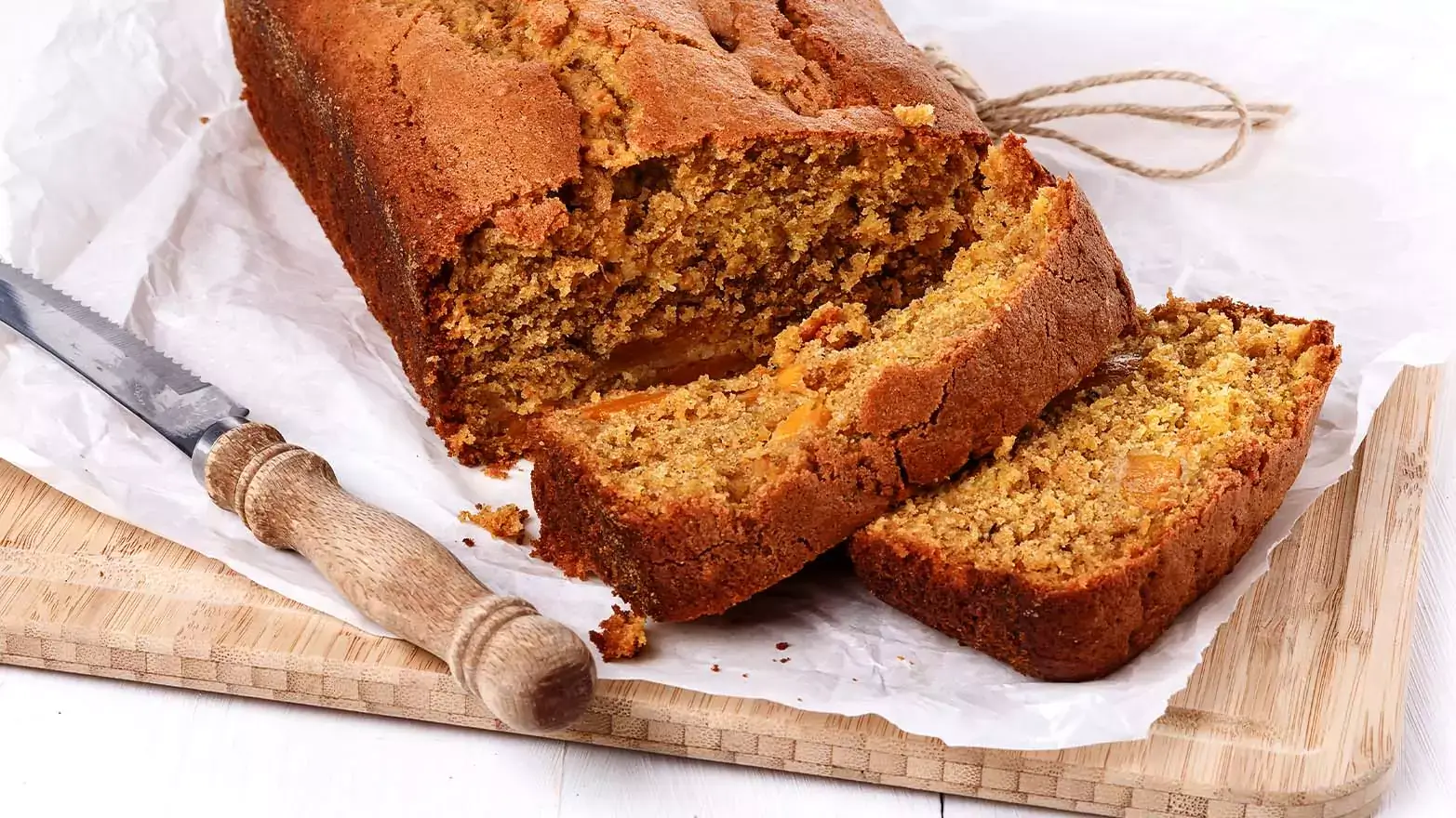 Slicing gluten-free pumpkin bread