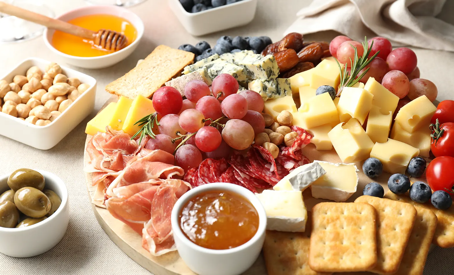 21-charcuterie-board-with-honey-and-jam.webp