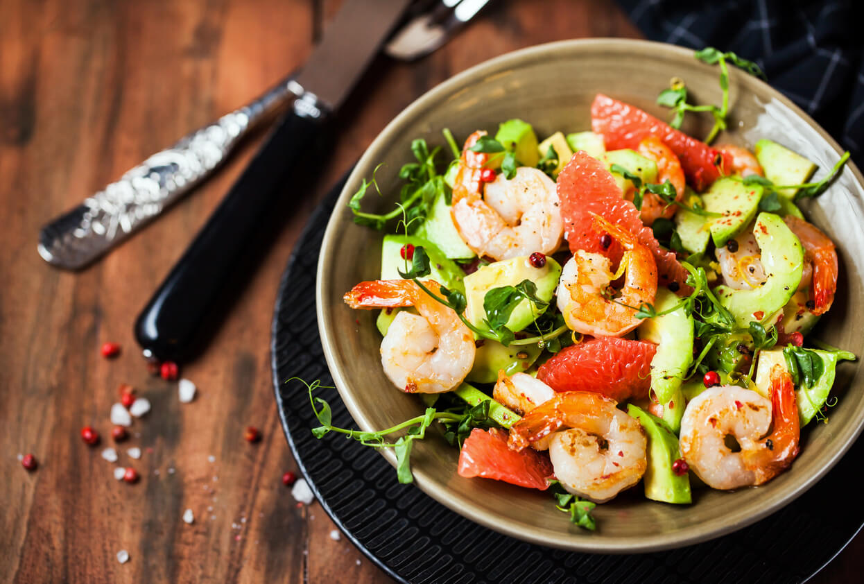 Delicious fresh salad with prawns, grapefruit, avocado, cucumber