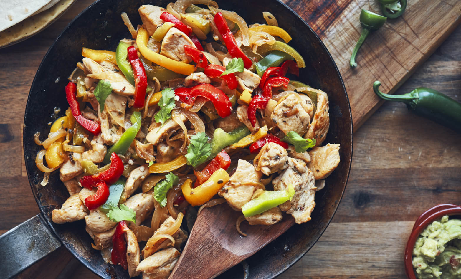 canned chicken fajitas with seasonal veggies in a skillet