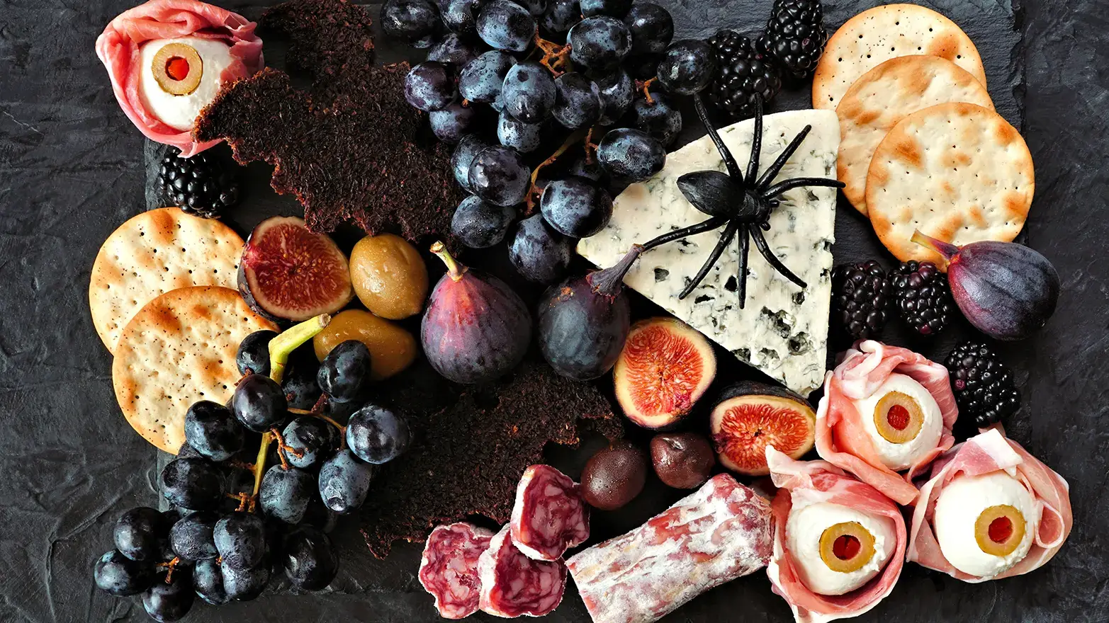 Array of Halloween charcuterie foods