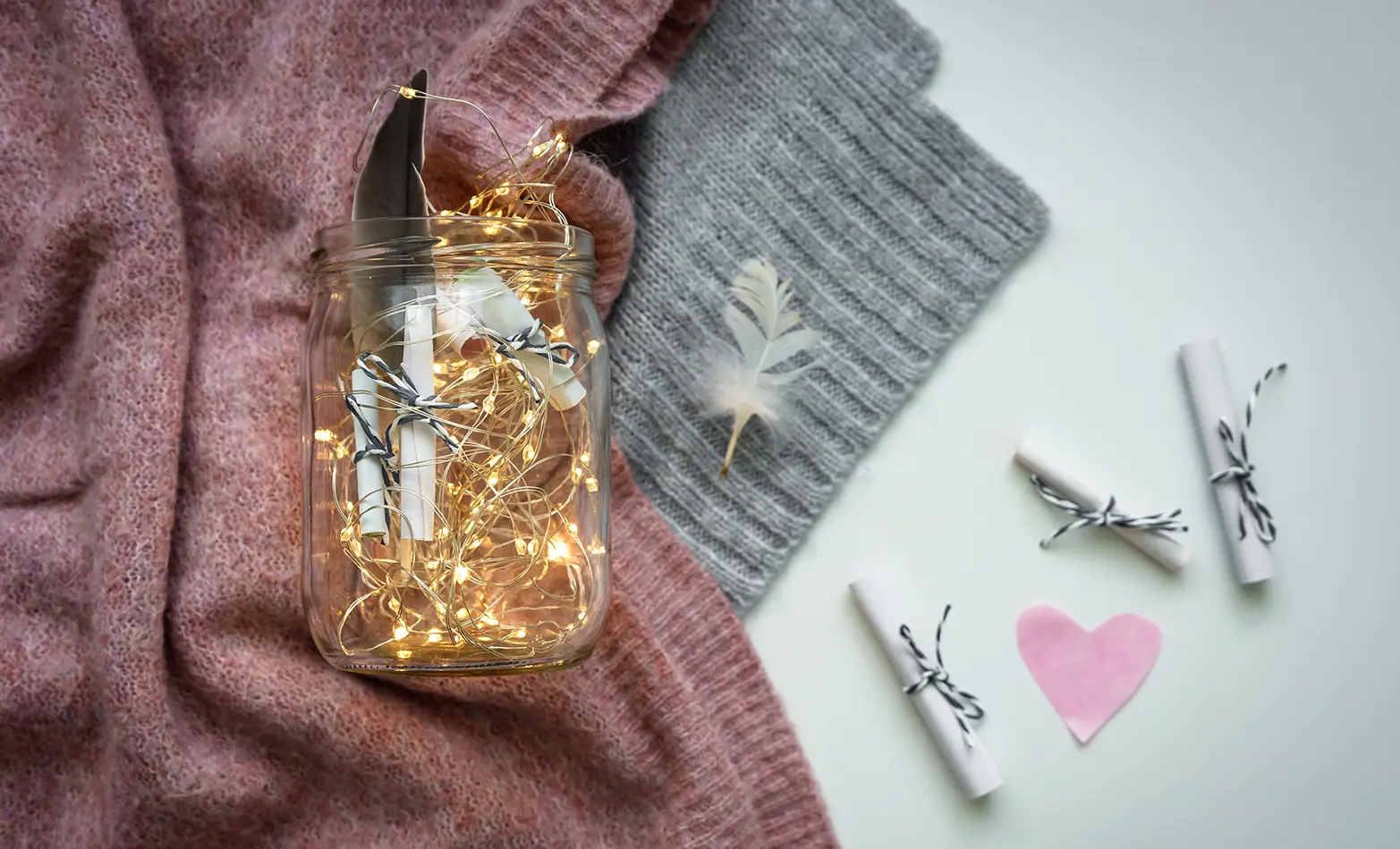 A photo of a mason jar of date ideas.
