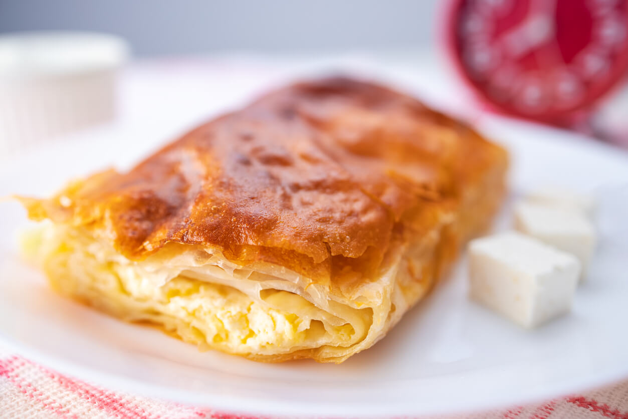 Baked cheese pie with milk. Bulgarian butter banitsa for breakfast
