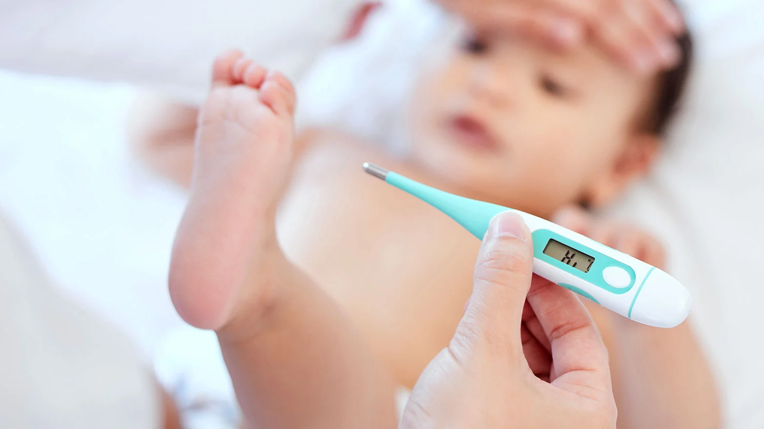 A stock photo of a digital thermometer designed for babies.