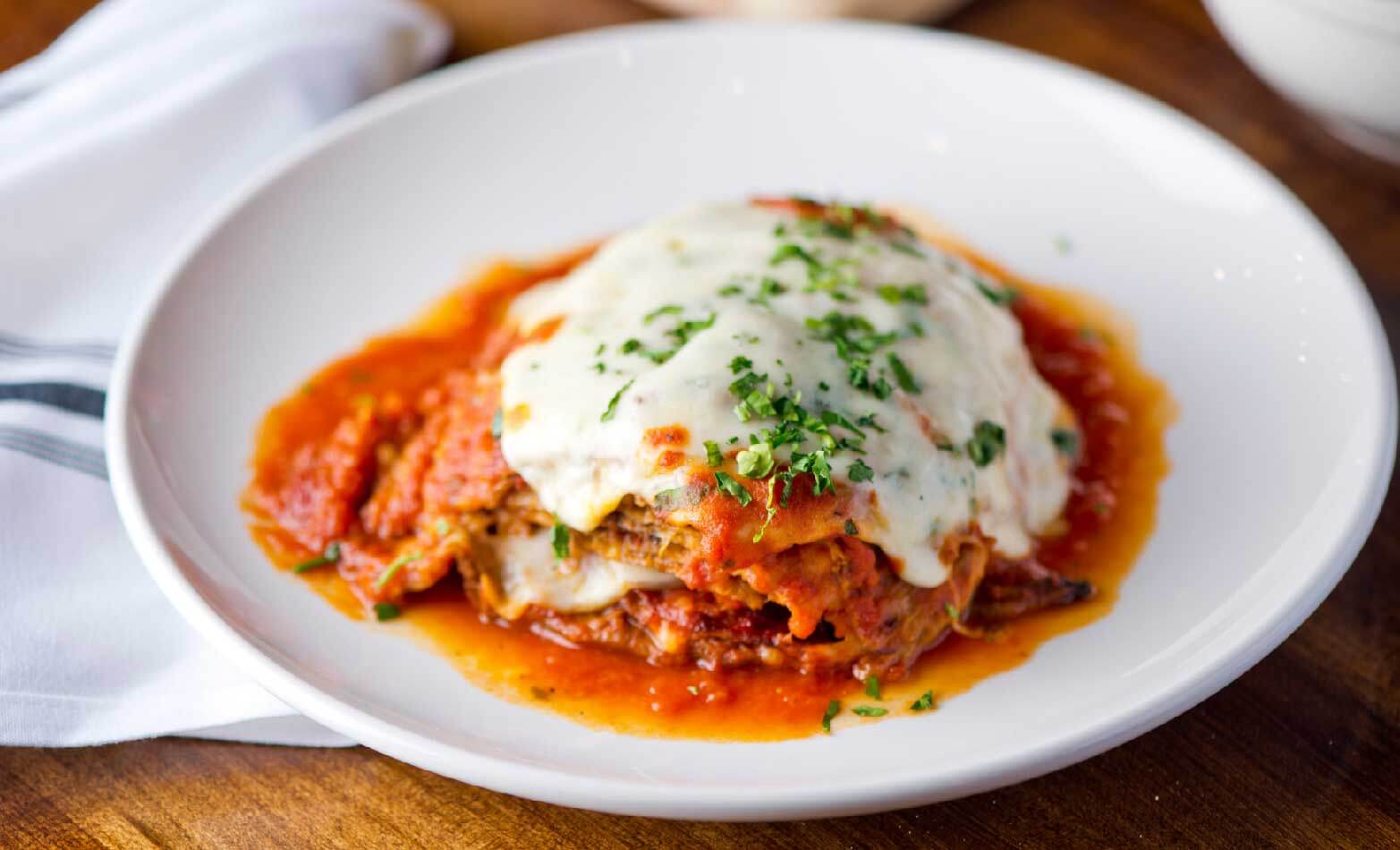 a stock photo of eggplant parmesan