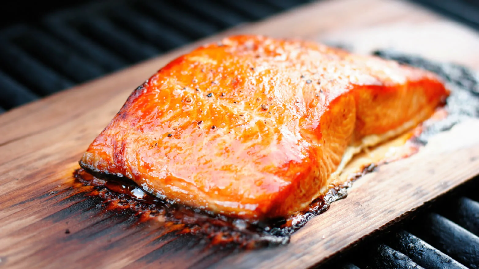 a photo of cedar plank salmon