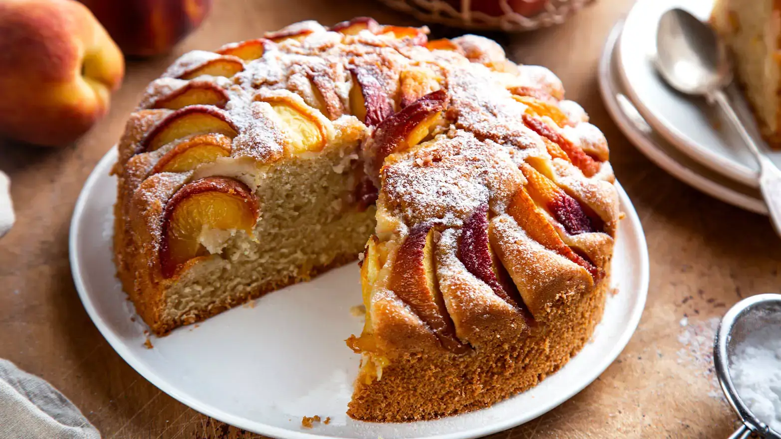 Peach cobbler pound cake with a slice cut out