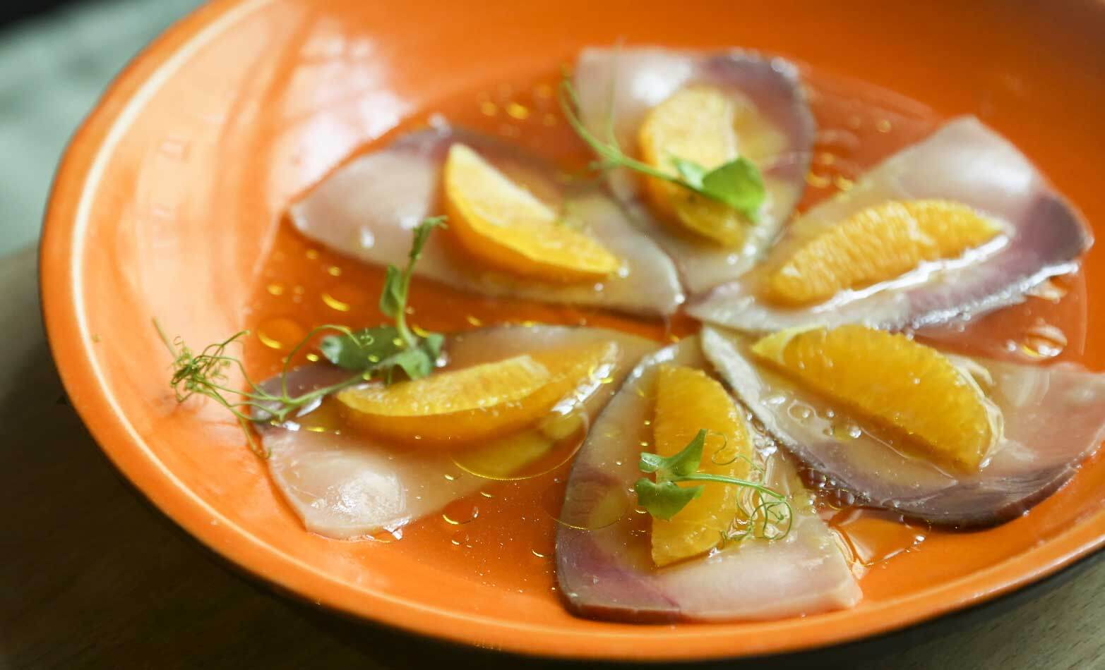 a stock photo of hamachi crudo