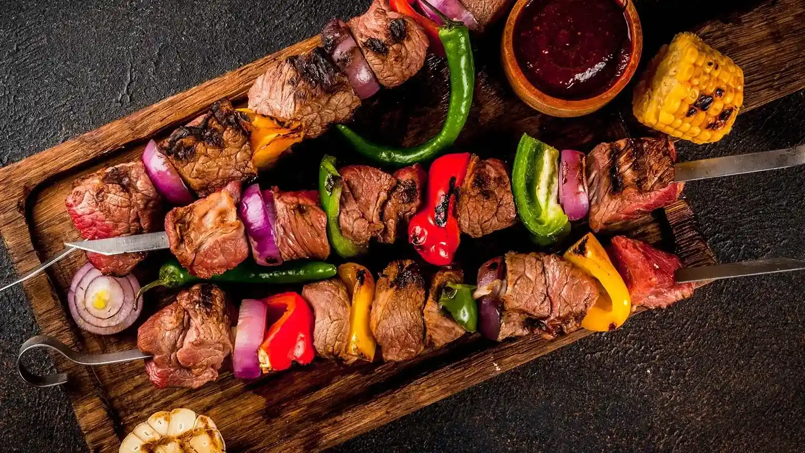 Beef-vegetable kebabs with orzo