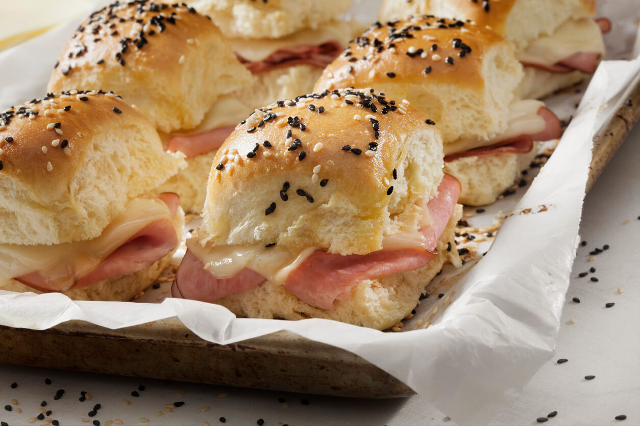 Baked Ham And Swiss Sliders on White Tray Buns
