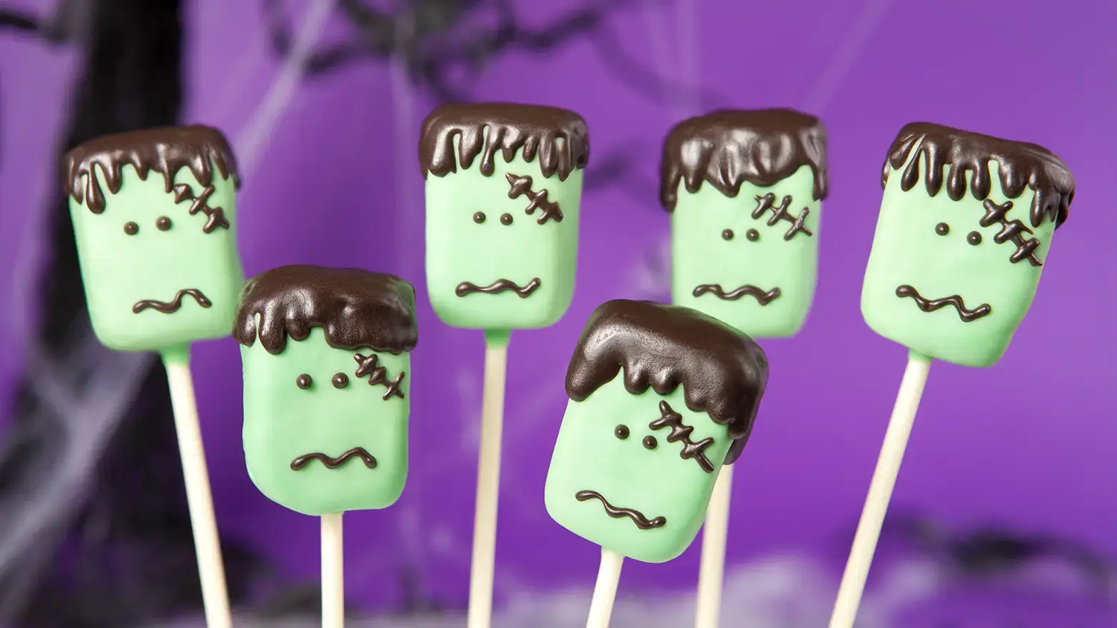 Chocolate dipped marshmallows decorated to look like Frankenstein