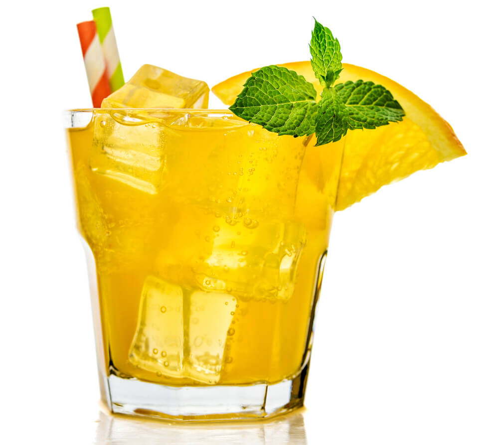 Glass of orange soda drink with ice isolated on white background