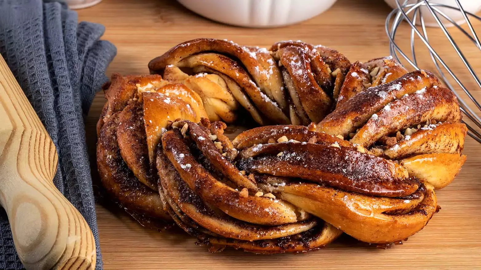 Cinnamon twist pastry on a wooden cutting board
