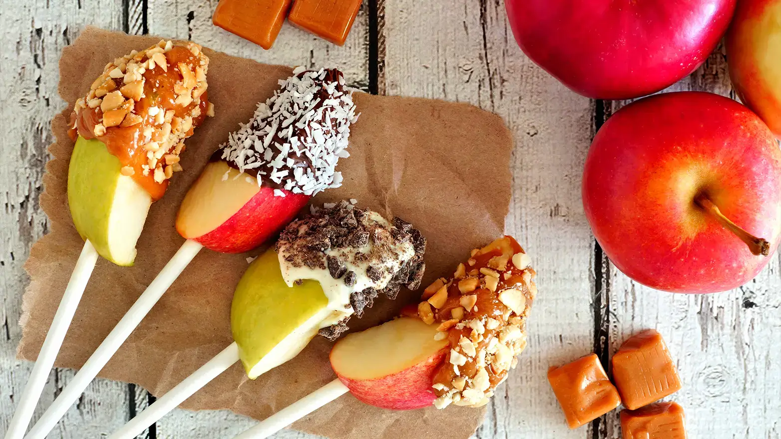 Caramel apple slices on sticks