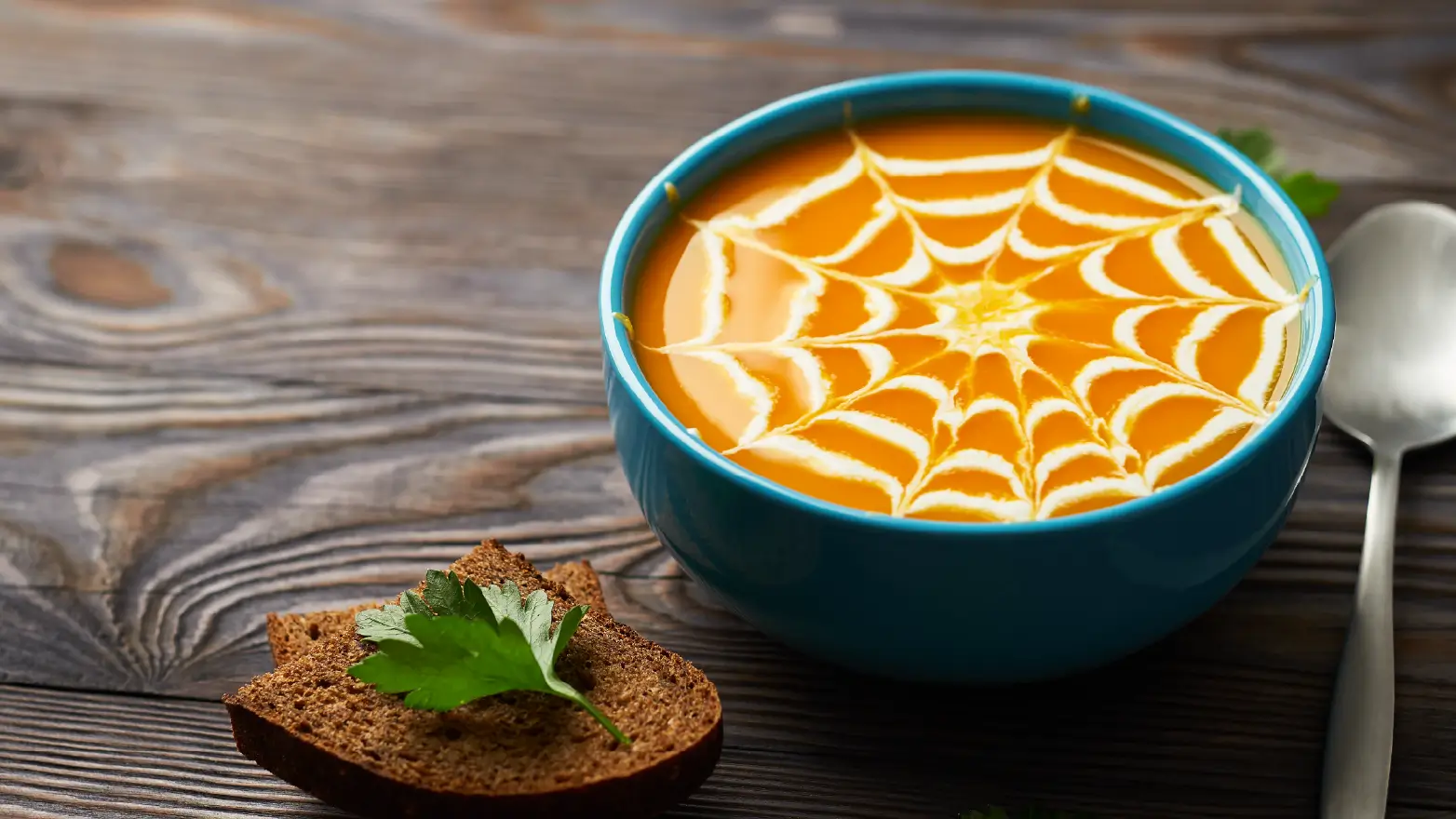 Pumpkin soup with web topping