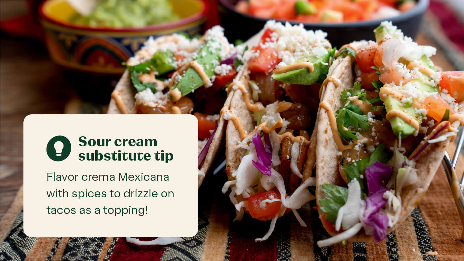 tacos with crema Mexicana drizzled on top