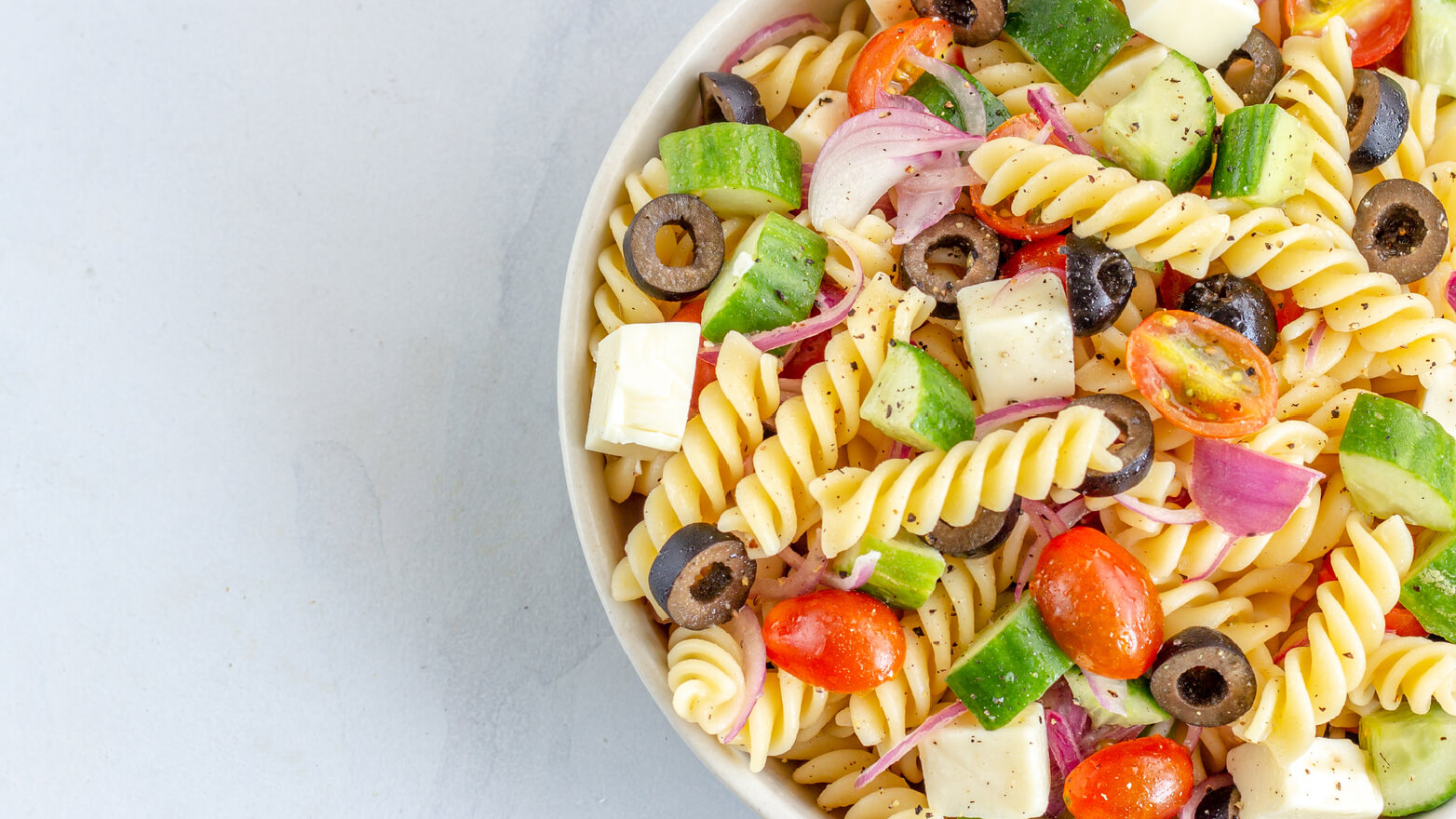 Pasta salad with tomatoes and olives