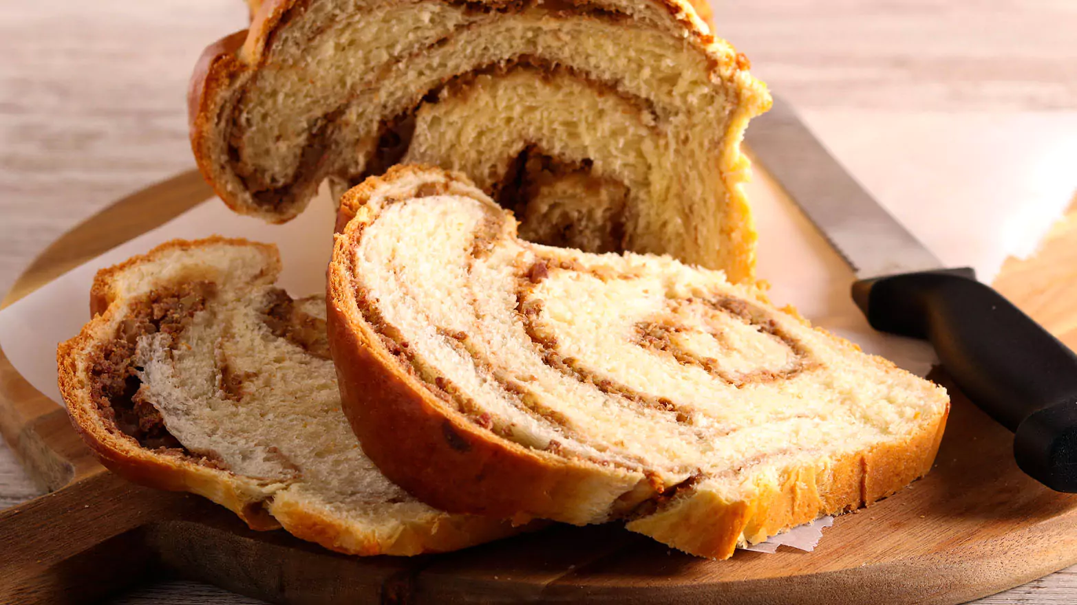 Sweet swirl cinnamon bread being sliced